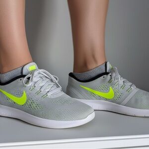 Nike Free RN in the "Pure Platinum/Volt-Black-Wolf Grey" Size 8.5)